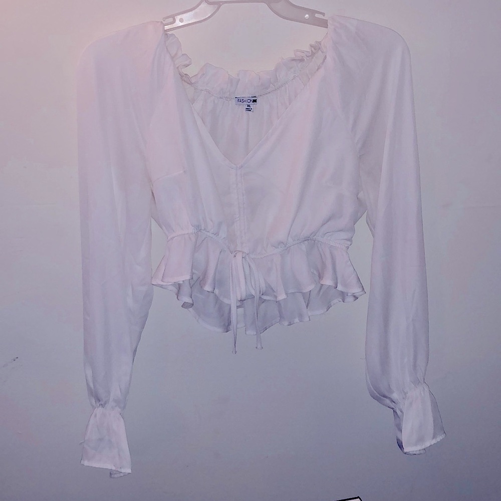 A cute white dressy top! Fashion Only wore once!